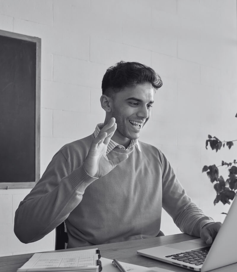 property manager at desk in front of computer