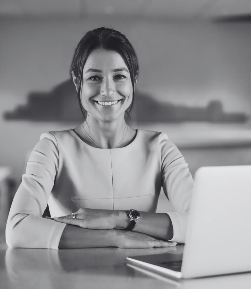 property manager at desk in front of computer