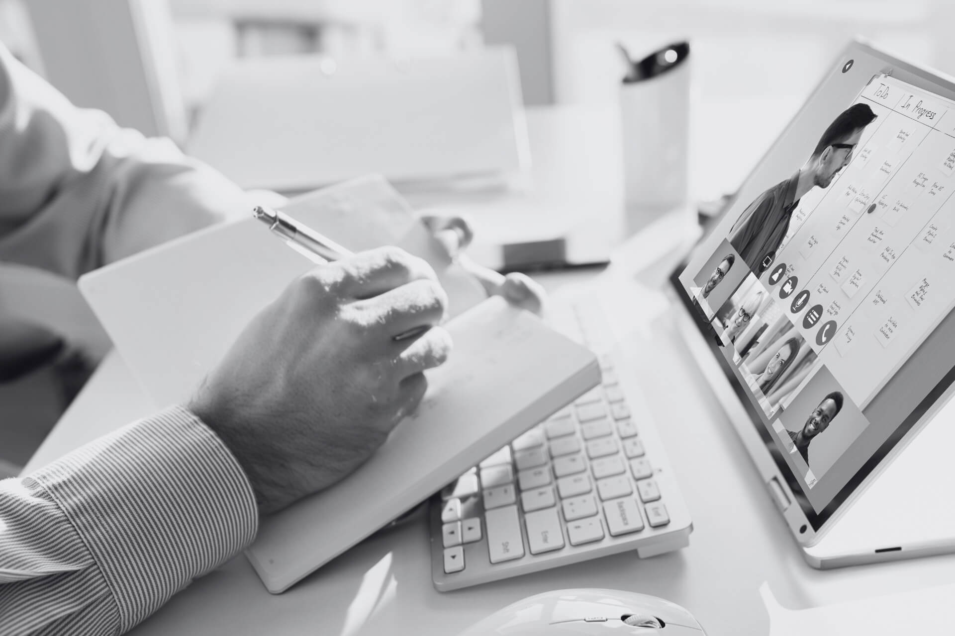 property manager at desk in front of computer